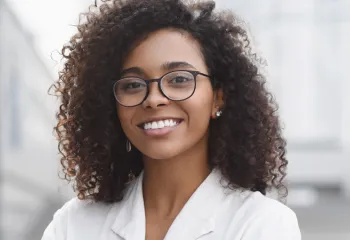 Close up of a smiling woman.