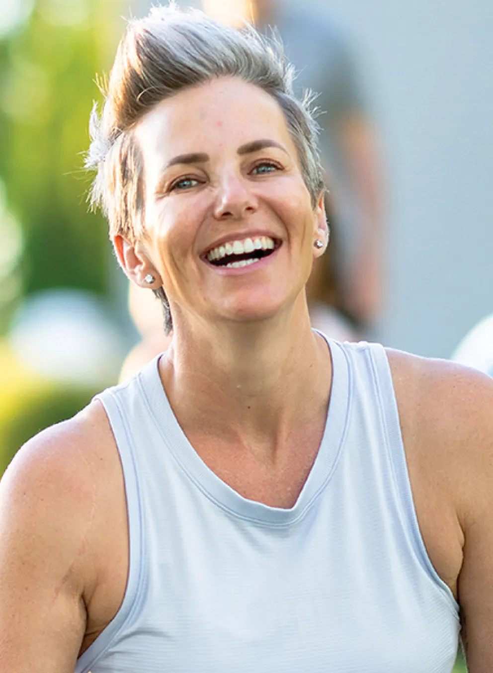 A women participates in an outdoor Yoga class.