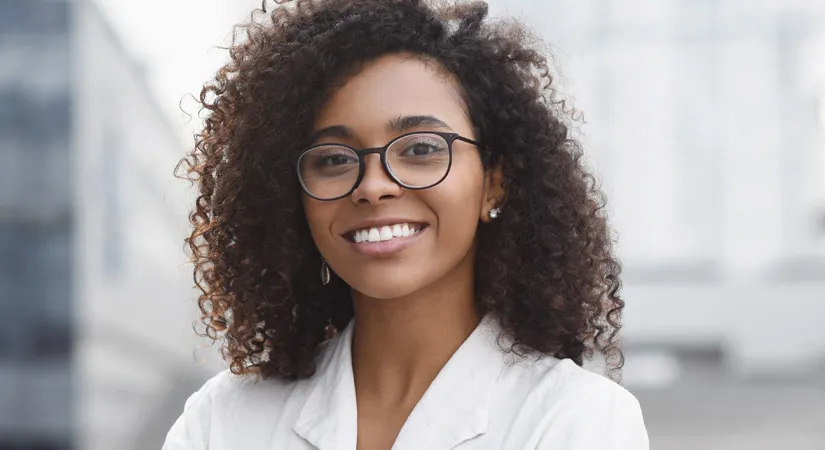 Close up of a smiling woman.